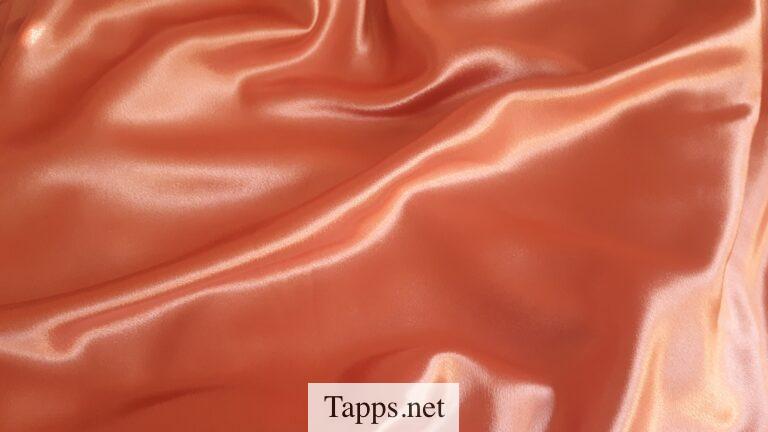 orange textile close-up photography
