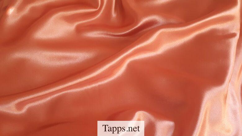 orange textile close-up photography