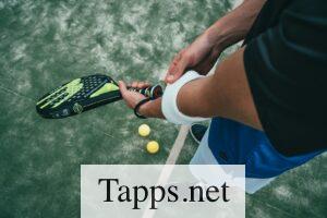 person holding tennis racket