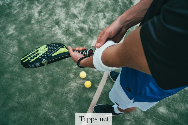 person holding tennis racket