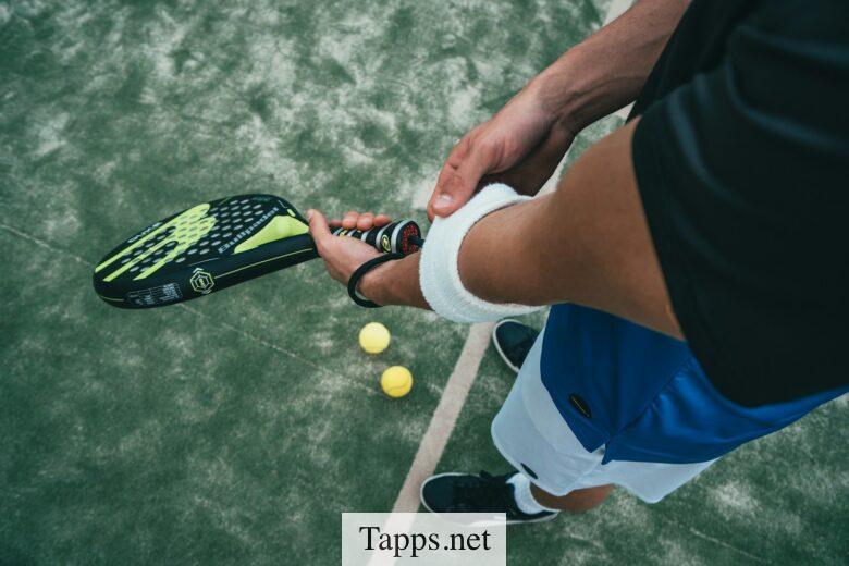person holding tennis racket