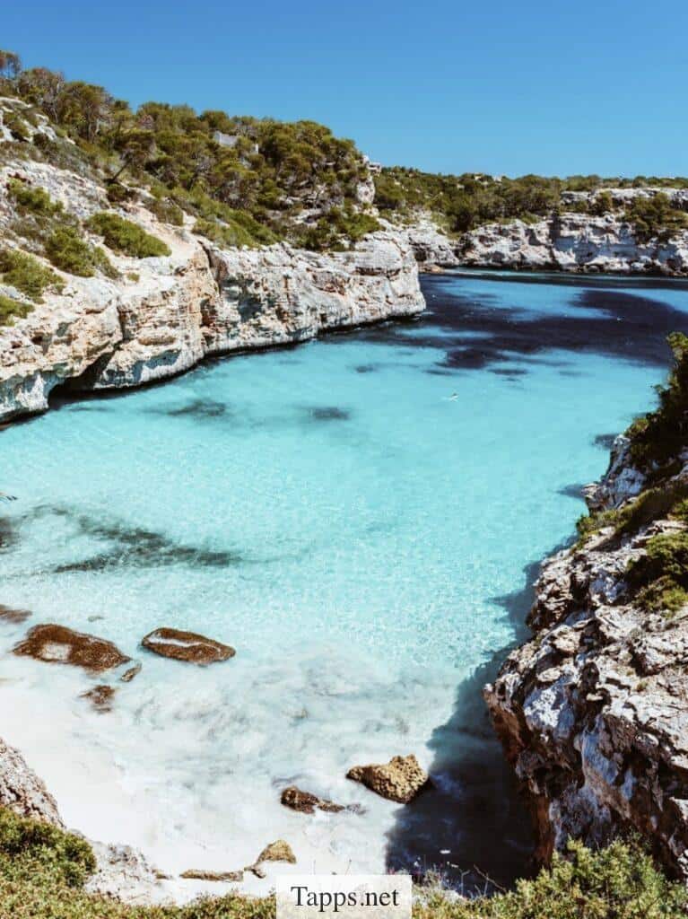 beach between cliffs
